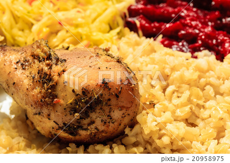 Chicken meat drumstick with rice and salad 20958975