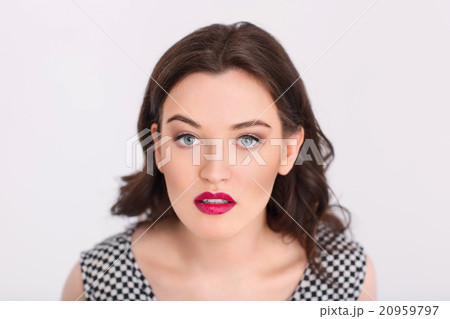 Pleasant woman looking at you 20959797