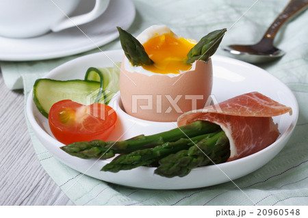Boiled egg with green asparagus, ham and vegetable Boiled egg with green asparagus, ham and vegetable 20960548