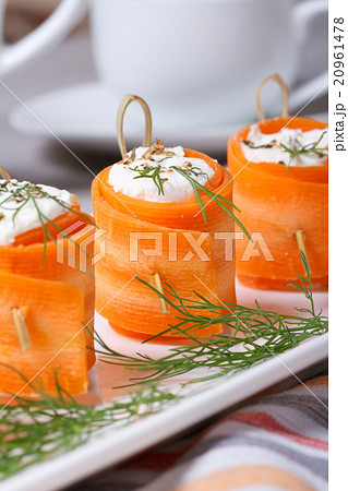 carrot rolls stuffed with feta cheese. Vertical 20961478