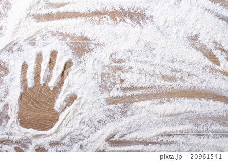 female palm print on flour scattered 20961541