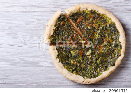 Open pies with herbs, cheese and spinach  top view 20961552