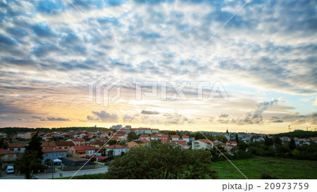 Sunset over village Sunset over village 20973759