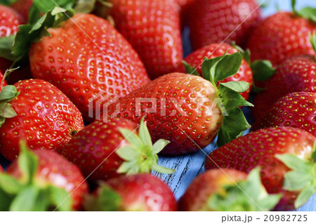 strawberries on a blue wooden surface 20982725
