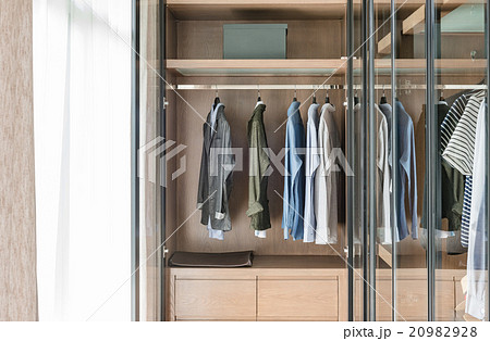 shirts and suite hanging on rail shirts and suite hanging on rail 20982928
