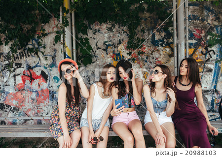 Five beautiful young girls relaxing 20988103