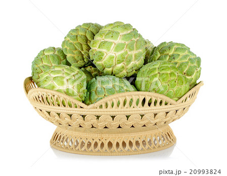 Sugar apple in the basket isolated on the white Sugar apple in the basket isolated on the white 20993824