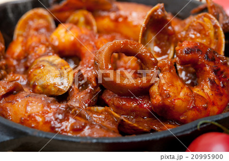 fresh seafoos stew on an iron skillet fresh seafoos stew on an iron skillet 20995900