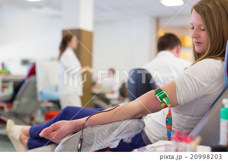 Nurse and blood donor at donation. 20998203