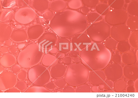 Macro shot of Olive oil mixed in water Macro shot of Olive oil mixed in water 21004240