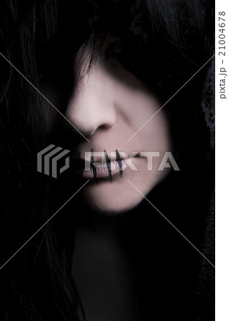 Dark female character with black cape 21004678