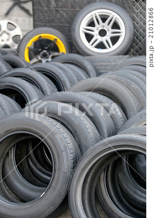 Pile of used rubber tyres. Pile of used rubber tyres. 21012866