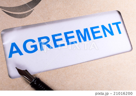 Agreement in brown envelope, use business concept Agreement in brown envelope, use business concept 21016200