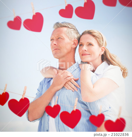 Composite image of happy couple spending time together Composite image of happy couple spending time together 21022836