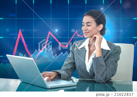 Composite image of smiling businesswoman using laptop at desk Composite image of smiling businesswoman using laptop at desk 21022837