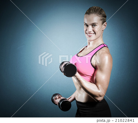 Composite image of muscular woman lifting heavy dumbbells Composite image of muscular woman lifting heavy dumbbells 21022841