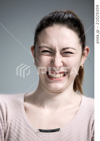 portrait of disgusted woman 21029309