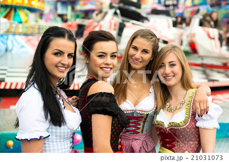 Gorgeous young women at German funfair 21031073
