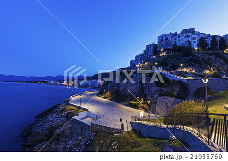Town on rocky hills at sunrise Town on rocky hills at sunrise 21033769