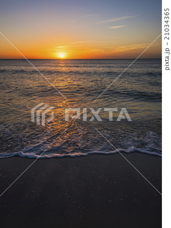 Beach and sea at sunset 21034365