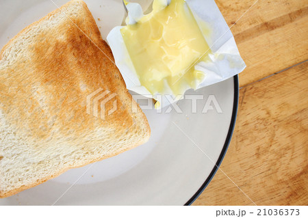 Slice toast bread with butter Slice toast bread with butter 21036373