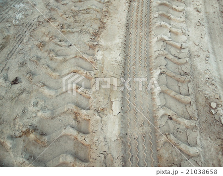 Wheel tracks on the soil. 21038658