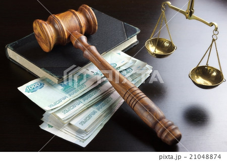 Judges Gavel, Scale, Old Book And Cash On Table Judges Gavel, Scale, Old Book And Cash On Table 21048874