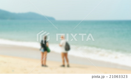 Blurred blue sea and white sand beach Blurred blue sea and white sand beach 21063323