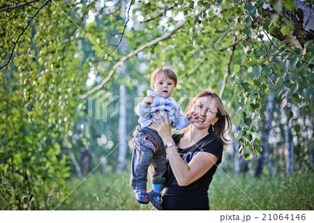 Mother and Son Having Fun in the forest 21064146
