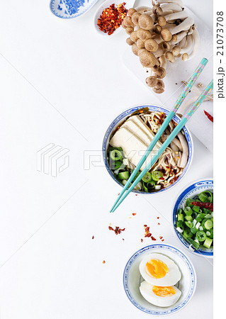 Asian soup ramen with feta cheese 21073708