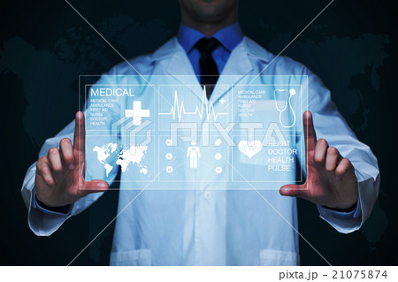 Doctor working on a virtual screen. medical 21075874