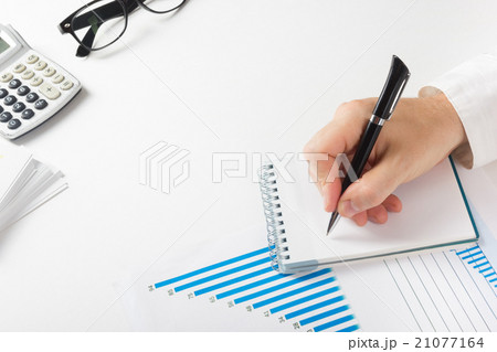 Businessman counting losses and profit working Businessman counting losses and profit working 21077164