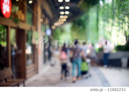 Blur people walking shopping green tree Blur people walking shopping green tree 21082252
