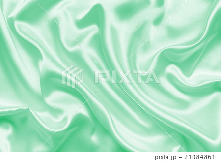 Smooth elegant green silk or satin texture Smooth elegant green silk or satin texture 21084861