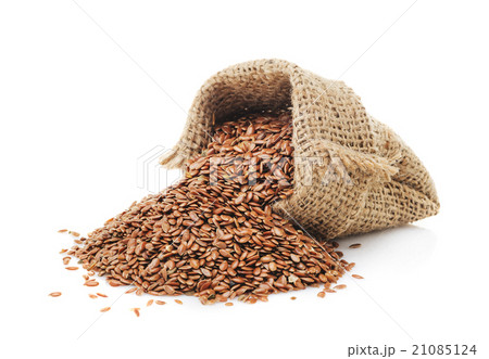 Flax seeds in a bag isolated 21085124