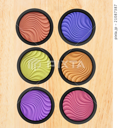 makeup eyeshadow on wooden background 21087387