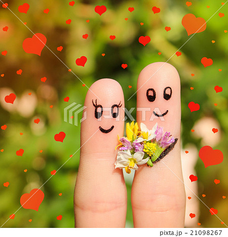 Finger art of a Happy couple. Man is giving flower Finger art of a Happy couple. Man is giving flower 21098267