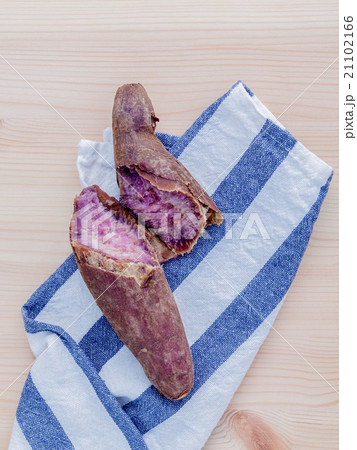 Cooked whole sweet potatoes . Cooked whole sweet potatoes . 21102166