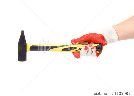 Man's hand in glove holds hammer. 21105907