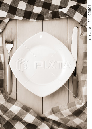 kitchen utensils and cloth napkin on wood 21106601