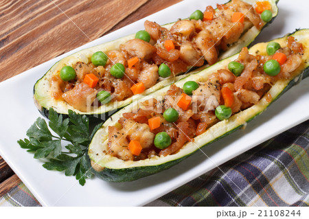 zucchini stuffed with meat, vegetables and cheese zucchini stuffed with meat, vegetables and cheese 21108244