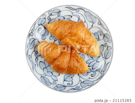 croissant on disk on white background 21115265
