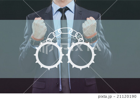 man in a business suit with chained hands man in a business suit with chained hands 21120190