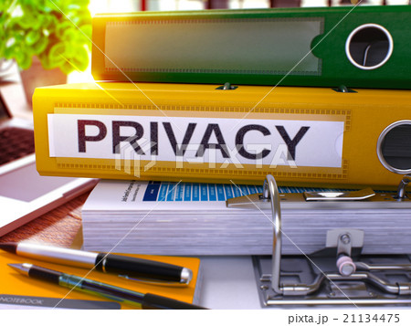 Privacy on Yellow Ring Binder. Blurred, Toned 21134475