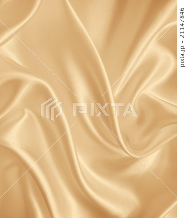 Smooth elegant golden silk or satin as background. 21147846