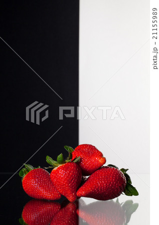 Strawberries on black and white background Strawberries on black and white background 21155989