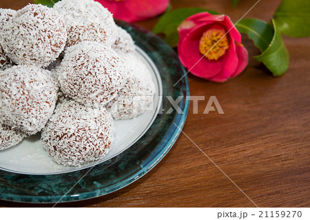 Snowball truffles of chocolate and coconut topping Snowball truffles of chocolate and coconut topping 21159270