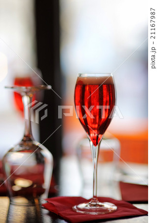 Glass with French alcohol drink Kir Royal 21167987