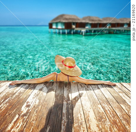 Woman at poolside 21169620