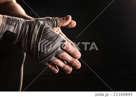 Close-up hand of muscular man with bandage 21169895